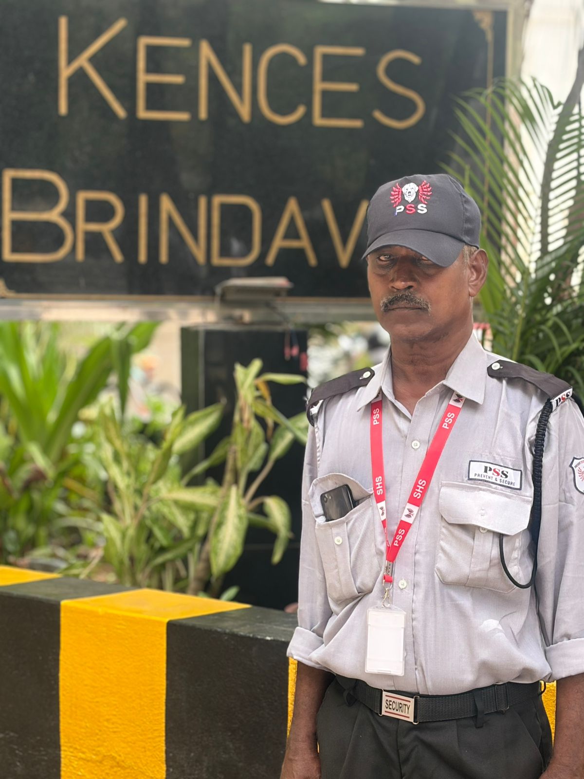 Trained security guard managing access control